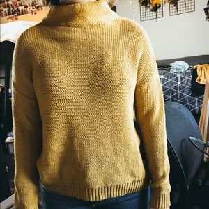 yellow mock neck sweater